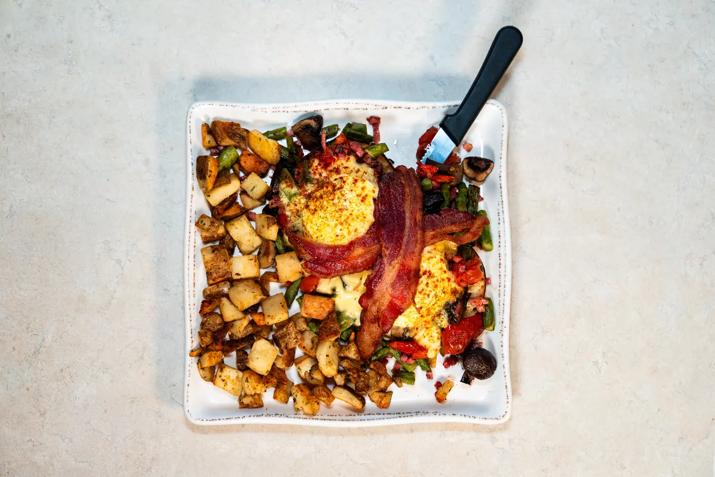 Hikers Benedict with ranch potatoes